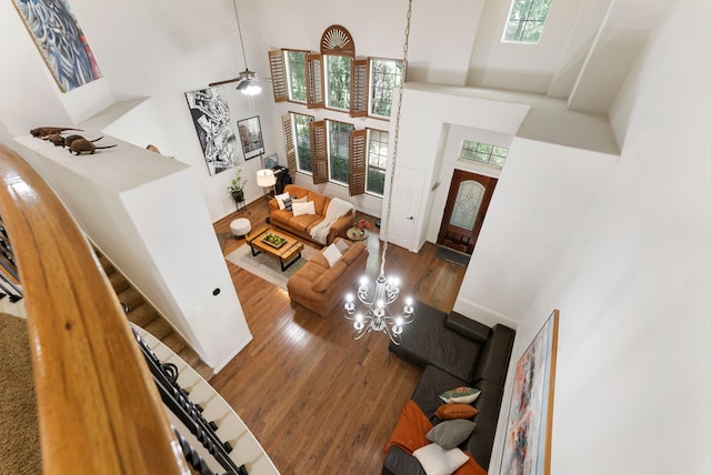27 Medley Ln, The Woodlands, TX 77382 - foyer with a high ceiling, wood finished floors, and ceiling fan