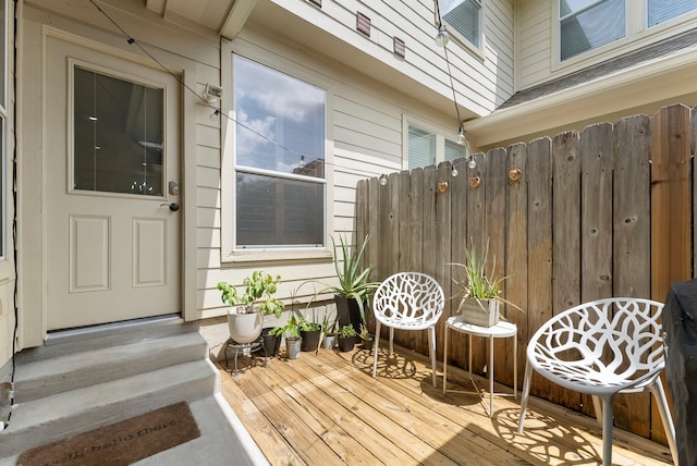 27 Medley Ln, The Woodlands, TX 77382 - doorway to property with a deck
