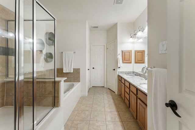 27 Medley Ln, The Woodlands, TX 77382 - bathroom with a bath, double vanity, a stall shower, and tile patterned flooring