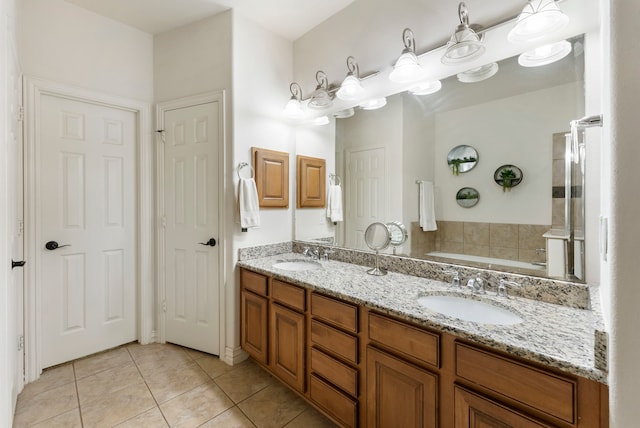27 Medley Ln, The Woodlands, TX 77382 - full bathroom featuring a bath, tile patterned floors, and double vanity