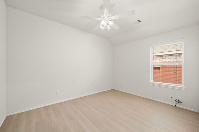3105 Zachary Bay Ln, League City, TX 77539 - spare room with light wood finished floors, a ceiling fan, lofted ceiling, and baseboards