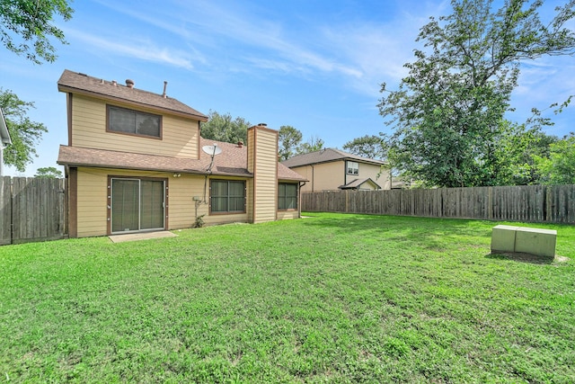 15415 Swan Creek Dr, Houston, TX 77095 - rear view of property featuring a chimney and roof with shingles