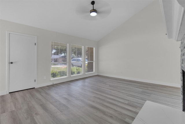 18010 Santolina Ln, Katy, TX 77449 - bonus room featuring a ceiling fan, wood finished floors, baseboards, and high vaulted ceiling
