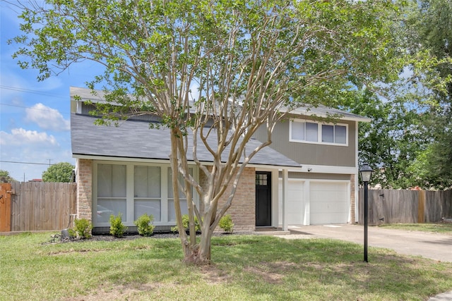 18010 Santolina Ln, Katy, TX 77449 - view of front of property featuring a garage and driveway