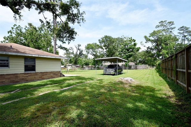 5216 Sue Marie Ln, Houston, TX 77091 - view of yard featuring a carport