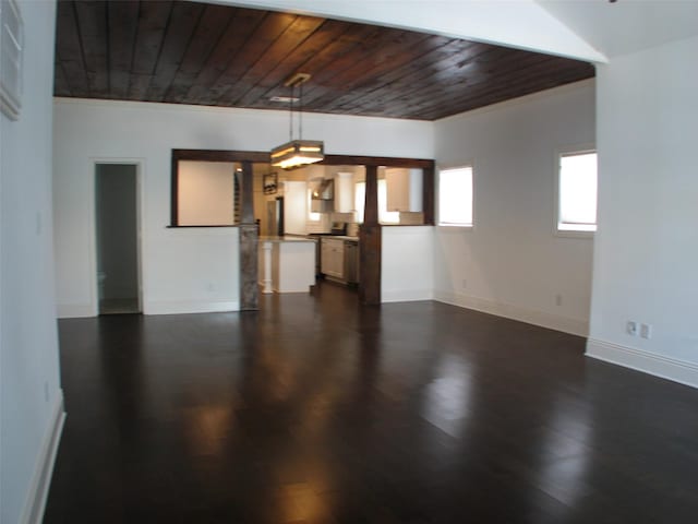 2405 Keene St, Houston, TX 77009 - unfurnished living room featuring ornamental molding, wood ceiling, baseboards, and dark wood-style flooring