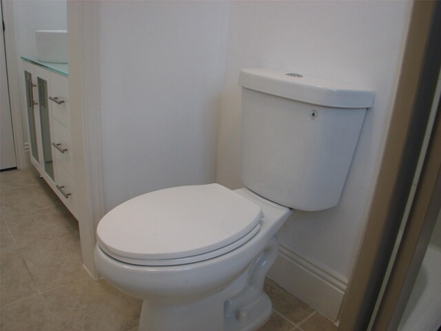 2405 Keene St, Houston, TX 77009 - bathroom featuring toilet, tile patterned floors, and baseboards