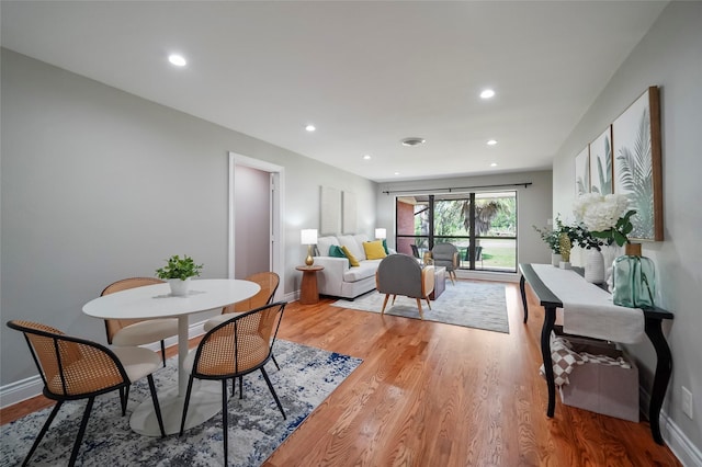 4266 T C Jester Blvd, Houston, TX 77018 - dining area featuring light wood-style floors, recessed lighting, and baseboards