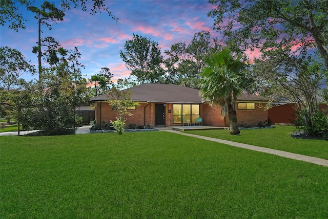 4266 T C Jester Blvd, Houston, TX 77018 - ranch-style home featuring a yard and brick siding