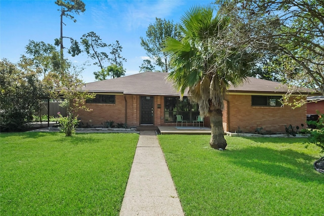 4266 T C Jester Blvd, Houston, TX 77018 - single story home featuring brick siding and a front yard