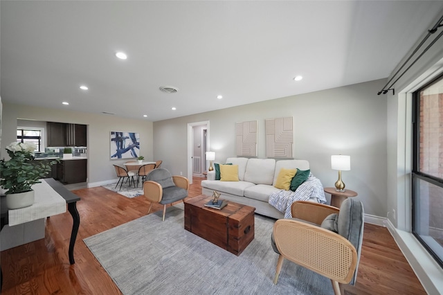 4266 T C Jester Blvd, Houston, TX 77018 - living area featuring wood finished floors, baseboards, and recessed lighting