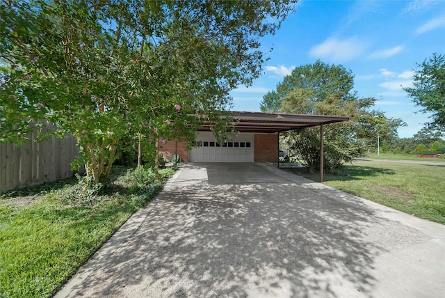 4266 T C Jester Blvd, Houston, TX 77018 - view of front of property featuring an attached garage, concrete driveway, and brick siding