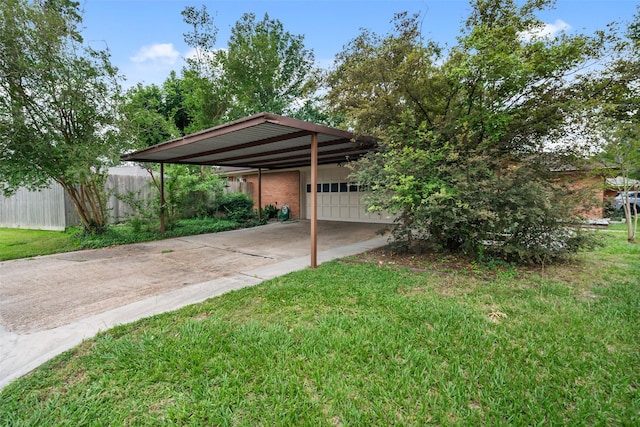4266 T C Jester Blvd, Houston, TX 77018 - view of yard with driveway, an attached garage, and a carport
