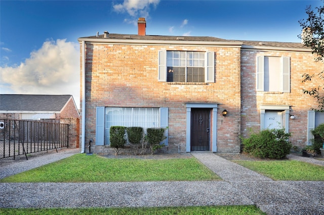 4164 Belle Park Dr Unit 4164, Houston, TX 77072 - view of property featuring fence, a chimney, and brick siding