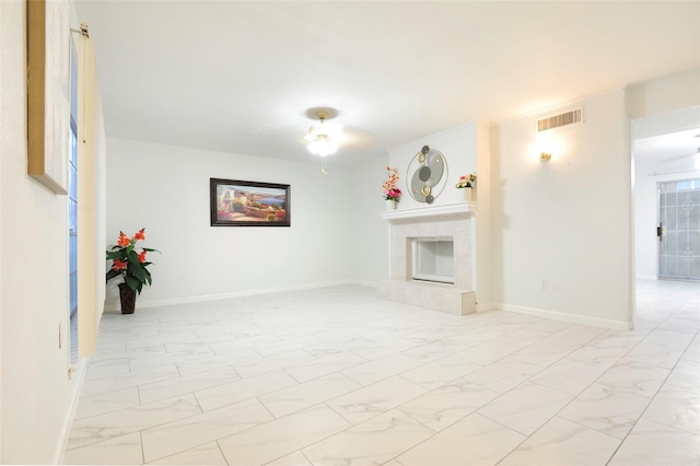 4164 Belle Park Dr Unit 4164, Houston, TX 77072 - unfurnished living room featuring light marble finish flooring, a tile fireplace, and baseboards