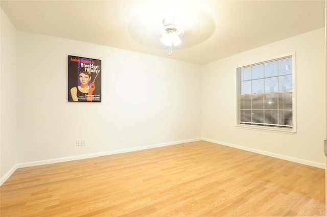 4164 Belle Park Dr Unit 4164, Houston, TX 77072 - spare room with light wood-style flooring, baseboards, and ceiling fan