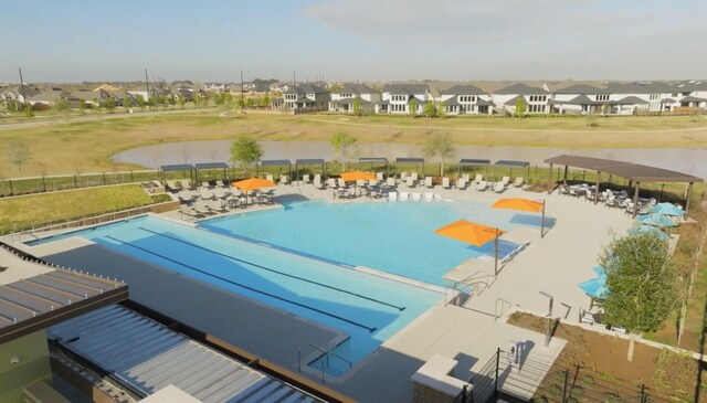 7014 Anacua Berry Cir, Katy, TX 77493 - community pool with a residential view and fence