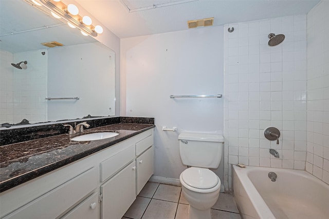 2250 Bering Dr Unit 101, Houston, TX 77057 - full bathroom featuring tile patterned floors, toilet, vanity, and washtub / shower combination