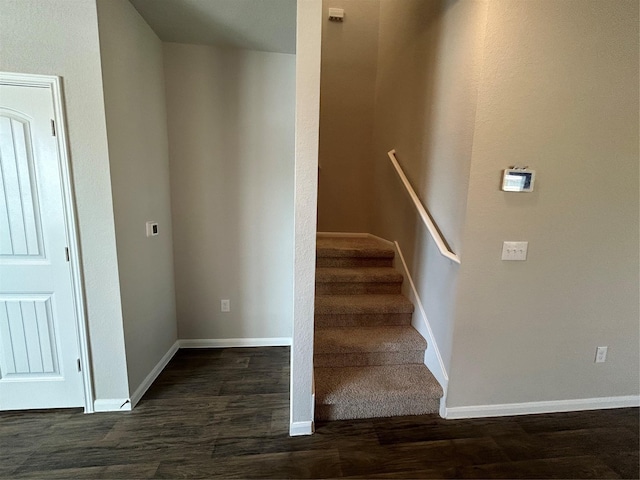 2002 Arborside Dr, Austin, TX 78754 - stairway with wood finished floors and baseboards