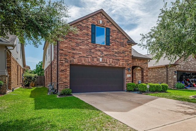 8113 E Pine Creek Bnd, Cypress, TX 77433 - view of front of property with a garage, brick siding, and driveway