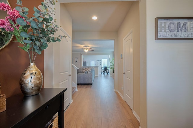 8113 E Pine Creek Bnd, Cypress, TX 77433 - corridor with recessed lighting, light wood finished floors, and baseboards