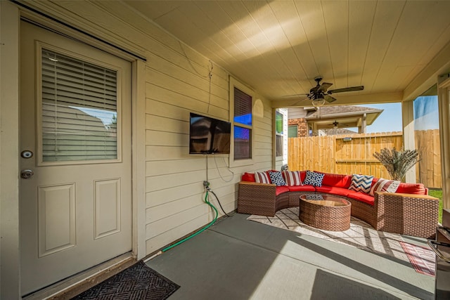 8113 E Pine Creek Bnd, Cypress, TX 77433 - view of patio / terrace featuring an outdoor living space, fence, and ceiling fan