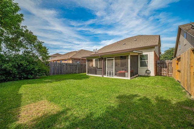 8113 E Pine Creek Bnd, Cypress, TX 77433 - back of property featuring a sunroom and roof with shingles