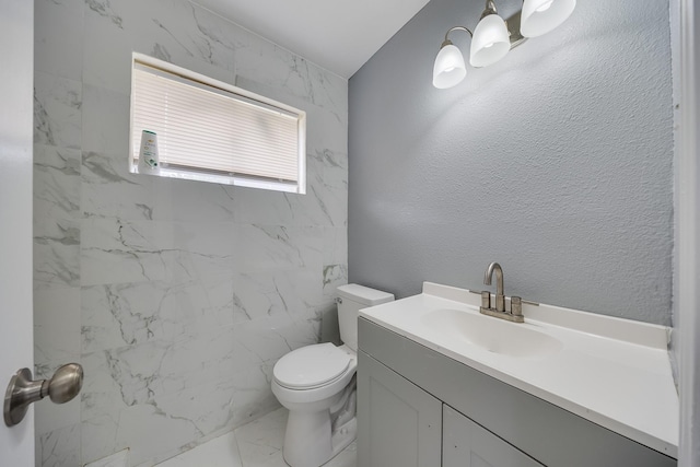 722 Dell Dale St, Channelview, TX 77530 - bathroom featuring marble finish flooring, vanity, toilet, and a shower