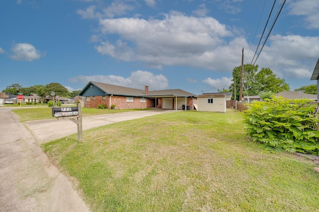 722 Dell Dale St, Channelview, TX 77530 - ranch-style home featuring concrete driveway, brick siding, an attached garage, and a chimney