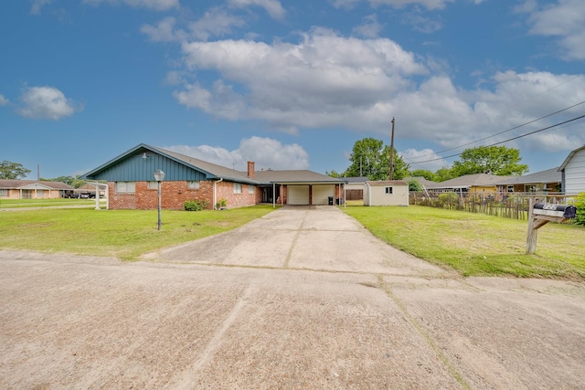 722 Dell Dale St, Channelview, TX 77530 - ranch-style house with concrete driveway, an attached garage, brick siding, and a chimney