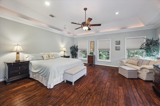 3388 Maroneal St, Houston, TX 77025 - bedroom featuring a raised ceiling, dark wood-style floors, baseboards, recessed lighting, and crown molding