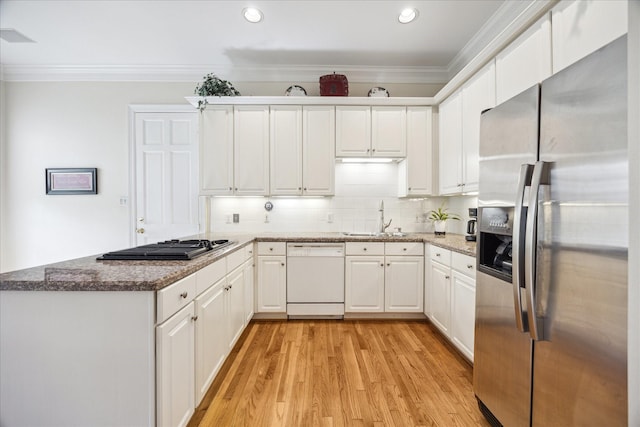 3388 Maroneal St, Houston, TX 77025 - kitchen with stainless steel fridge with ice dispenser, white dishwasher, a sink, light wood-type flooring, and ornamental molding