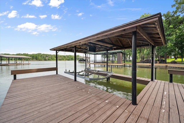 123 June Blvd, Streetman, TX 75859 - dock area with boat lift and a water view