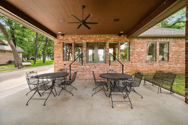 123 June Blvd, Streetman, TX 75859 - view of patio featuring outdoor dining space and a ceiling fan
