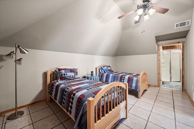 123 June Blvd, Streetman, TX 75859 - tiled bedroom featuring vaulted ceiling, baseboards, and a ceiling fan