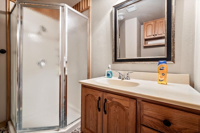 123 June Blvd, Streetman, TX 75859 - full bath with a stall shower, vanity, and a textured wall