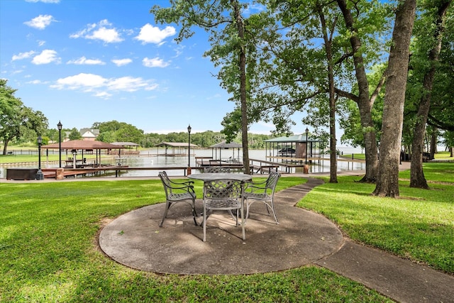 123 June Blvd, Streetman, TX 75859 - view of patio / terrace with boat lift, a boat dock, a water view, and a gazebo