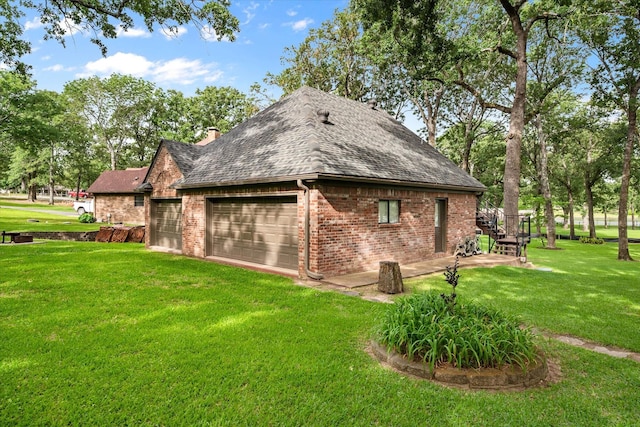 123 June Blvd, Streetman, TX 75859 - view of side of property featuring brick siding, roof with shingles, a yard, and a chimney