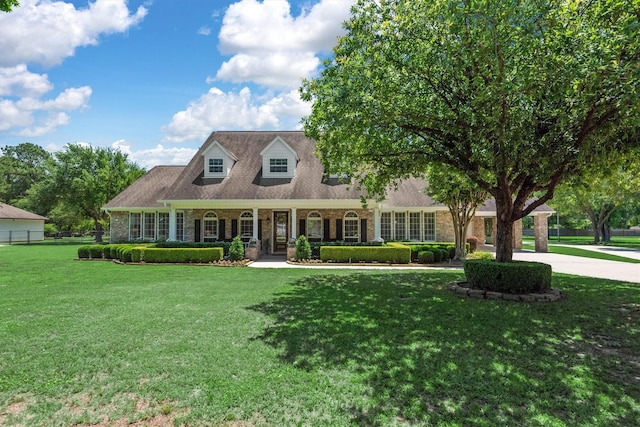 18106 E Cypress Hill Cir, Cypress, TX 77433 - cape cod-style house with covered porch and concrete driveway