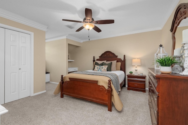 18106 E Cypress Hill Cir, Cypress, TX 77433 - bedroom with light carpet, ornamental molding, a closet, a ceiling fan, and baseboards