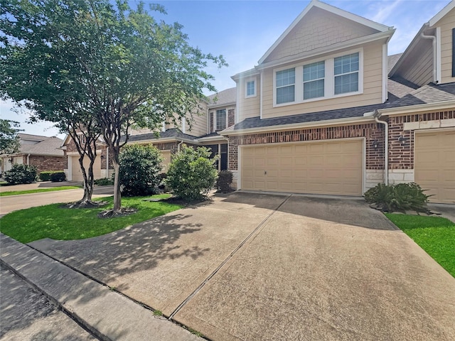 2822 Windy Thicket Ln, Houston, TX 77082 - view of front of property with driveway, brick siding, roof with shingles, and a garage