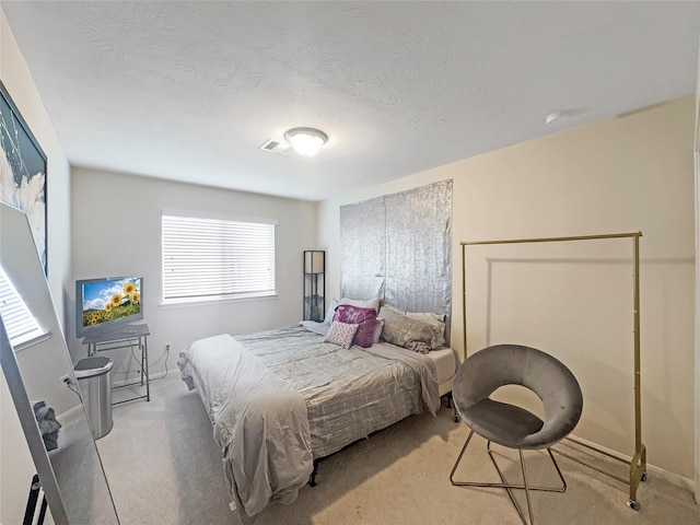 2822 Windy Thicket Ln, Houston, TX 77082 - carpeted bedroom featuring baseboards and a textured ceiling