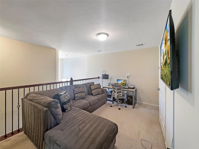 2822 Windy Thicket Ln, Houston, TX 77082 - living room featuring a desk, light colored carpet, and baseboards