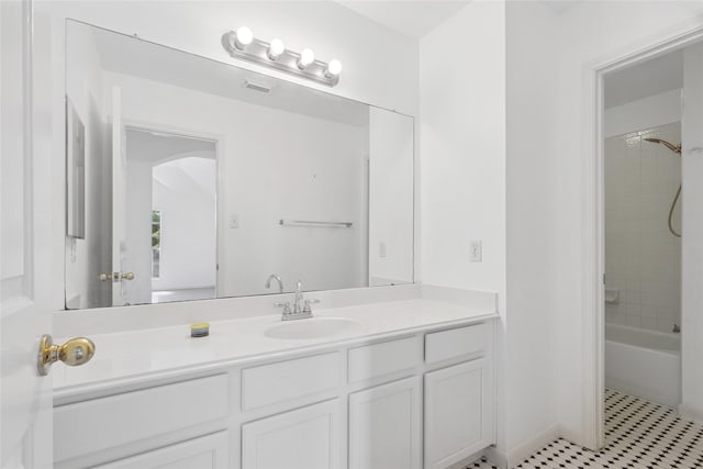 6414 Windmist Cir, Houston, TX 77084 - bathroom featuring vanity, tile patterned floors, and shower / washtub combination