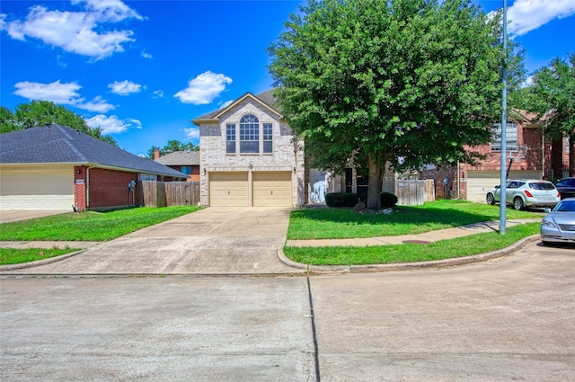 6414 Windmist Cir, Houston, TX 77084 - view of front of house featuring a garage, driveway, and brick siding