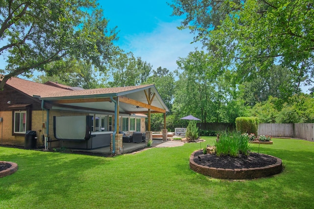 10022 Jan Glen Ln, Houston, TX 77070 - view of yard featuring ceiling fan, a patio area, and an outdoor hangout area