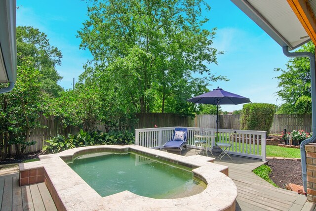 10022 Jan Glen Ln, Houston, TX 77070 - view of swimming pool featuring a wooden deck and a fenced backyard