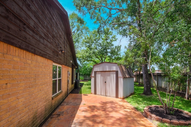 10022 Jan Glen Ln, Houston, TX 77070 - view of patio / terrace featuring a storage shed and an outbuilding