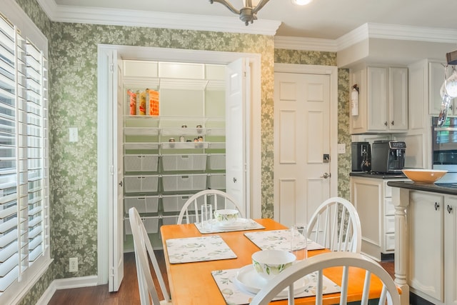 10022 Jan Glen Ln, Houston, TX 77070 - dining area featuring wallpapered walls, dark wood-style flooring, plenty of natural light, crown molding, and baseboards