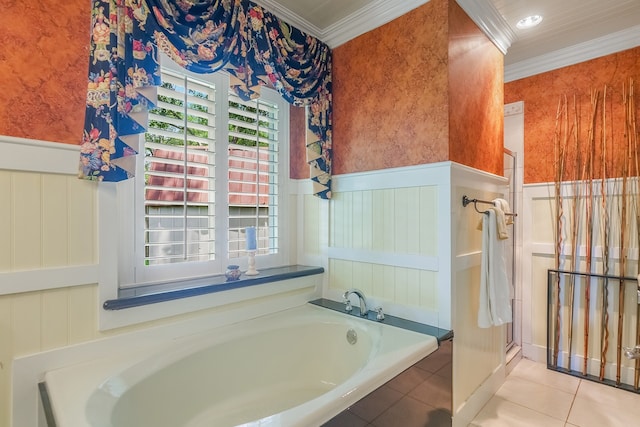 10022 Jan Glen Ln, Houston, TX 77070 - bathroom with ornamental molding, tile patterned floors, a wainscoted wall, a garden tub, and a stall shower